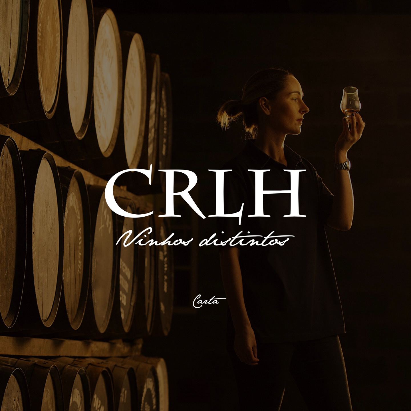 CRLH Vinhos Distintos — the wine list cover, shot in the cellar